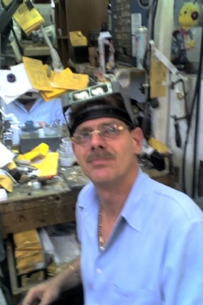 Paul at his workbench at The Jewel Doctor